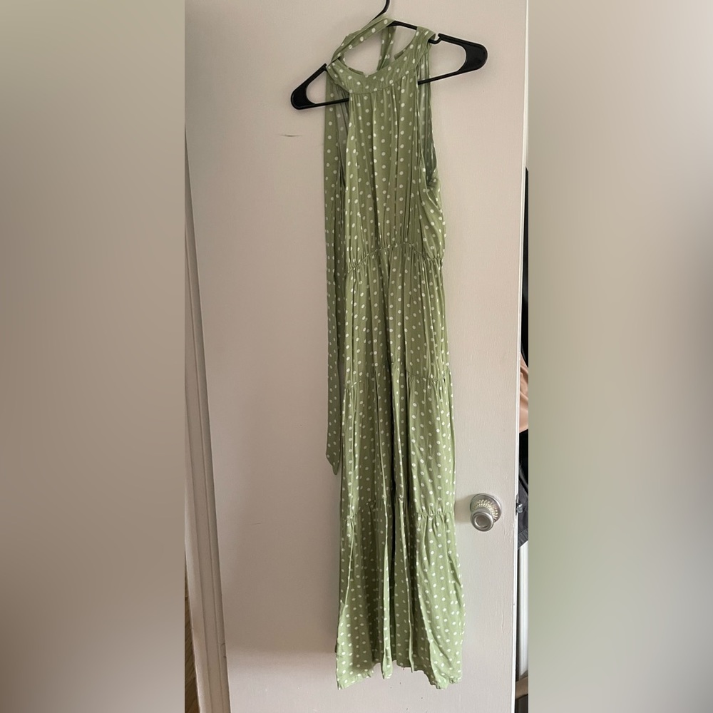 Maxi dress with Pearl button closure.
